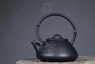 《石瓢提梁》宜興紫砂壺工藝美術師手工小容量功夫茶壺紫泥還原燒石瓢提梁  《石瓢提梁》宜興紫砂壺工藝美術師手工小容量功夫茶壺紫泥還原燒石瓢提梁